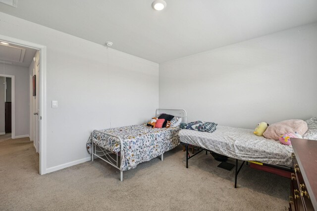 2410 Tate Farm Ln, White House, TN 37188 - carpeted bedroom with attic access and baseboards