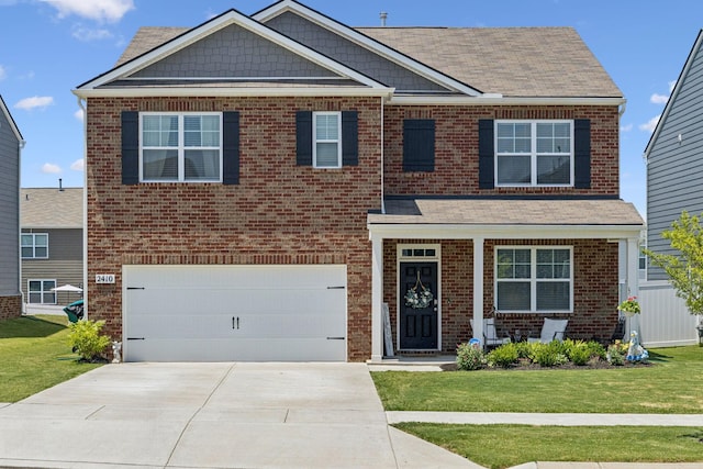 2410 Tate Farm Ln, White House, TN 37188 - view of front facade with brick siding, an attached garage, a front lawn, concrete driveway, and roof with shingles