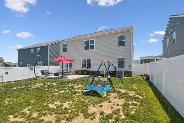 2410 Tate Farm Ln, White House, TN 37188 - back of house with a patio area and a fenced backyard