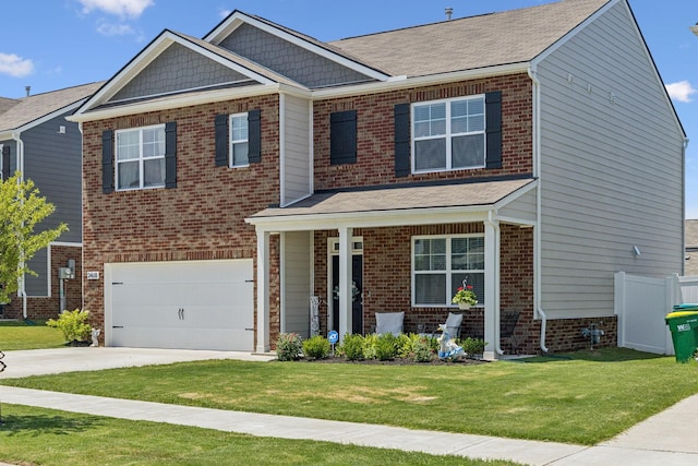 2410 Tate Farm Ln, White House, TN 37188 - view of front of house featuring concrete driveway, brick siding, an attached garage, and a porch