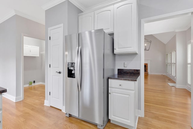 2910 Chaucer Dr, Murfreesboro, TN 37129 - kitchen featuring stainless steel refrigerator with ice dispenser, light wood-type flooring, white cabinets, crown molding, and lofted ceiling