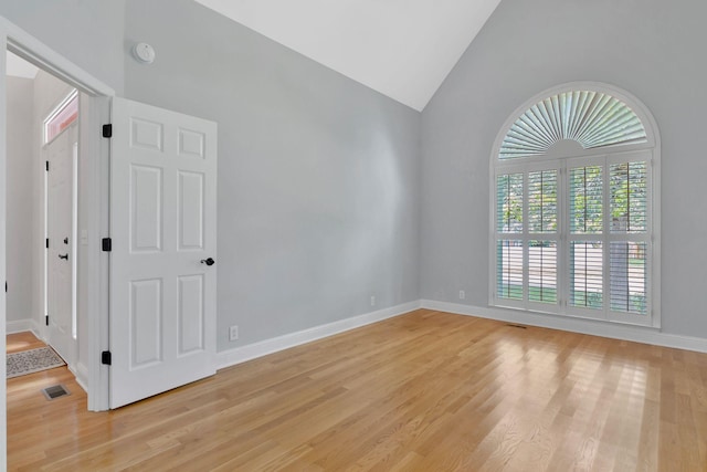 2910 Chaucer Dr, Murfreesboro, TN 37129 - unfurnished room with light wood-style flooring, high vaulted ceiling, and a smoke detector