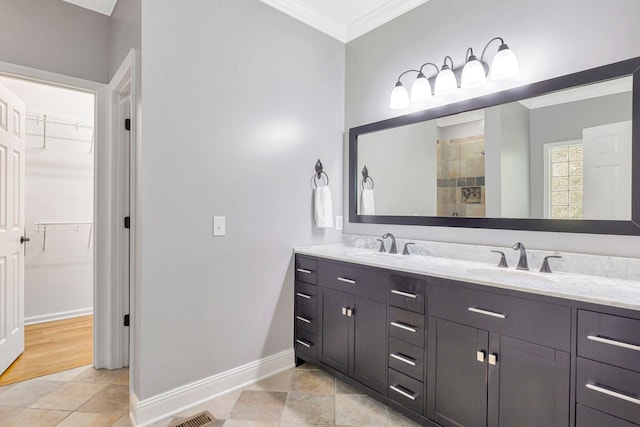 2910 Chaucer Dr, Murfreesboro, TN 37129 - full bath with crown molding, double vanity, a walk in closet, tile patterned flooring, and tiled shower
