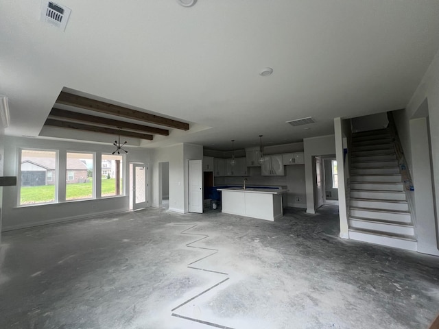 1830 Ableson Way, Columbia, TN 38401 - unfurnished living room with unfinished concrete floors and stairs