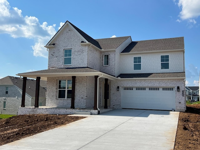 1830 Ableson Way, Columbia, TN 38401 - view of front of home featuring a porch, a garage, driveway, brick siding, and a shingled roof