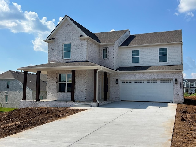 1830 Ableson Way, Columbia, TN 38401 - view of front of house featuring a porch, concrete driveway, an attached garage, brick siding, and a shingled roof
