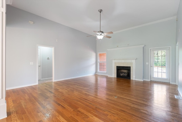 717 Pleasant View Dr, Columbia, TN 38401 - unfurnished living room with high vaulted ceiling, ceiling fan, wood finished floors, and a fireplace