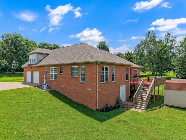 717 Pleasant View Dr, Columbia, TN 38401 - view of side of property featuring stairs, a wooden deck, driveway, brick siding, and a yard