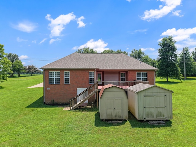 717 Pleasant View Dr, Columbia, TN 38401 - back of property featuring a storage shed, brick siding, stairs, and a yard