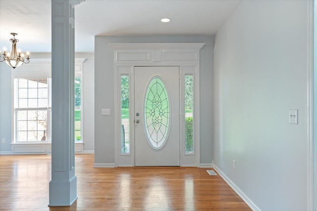 717 Pleasant View Dr, Columbia, TN 38401 - foyer with plenty of natural light, wood finished floors, and a chandelier