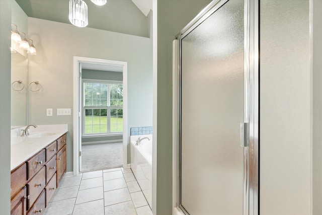 717 Pleasant View Dr, Columbia, TN 38401 - full bath featuring tile patterned flooring, vanity, a stall shower, and a garden tub