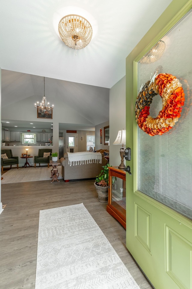 30 Hunting Ridge Cir, Rock Spring, GA 30739 - entrance foyer featuring a chandelier, light wood-style floors, and vaulted ceiling