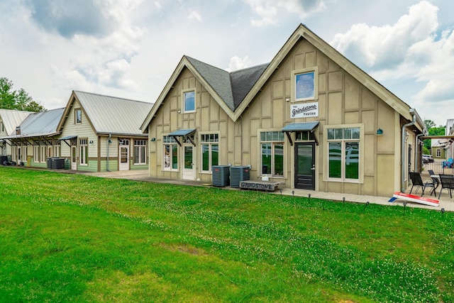 30 Hunting Ridge Cir, Rock Spring, GA 30739 - back of property featuring a yard, board and batten siding, and a patio