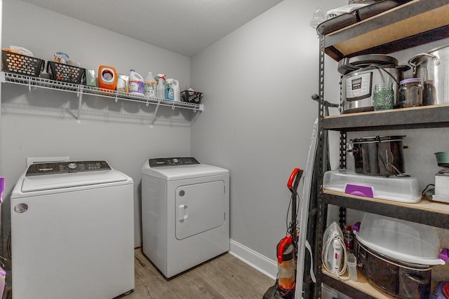 30 Hunting Ridge Cir, Rock Spring, GA 30739 - laundry room featuring washer and dryer and wood finished floors