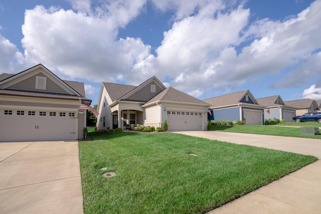 1727 Humphreys Gln, Spring Hill, TN 37174 - view of front of home featuring driveway, a front yard, and a garage