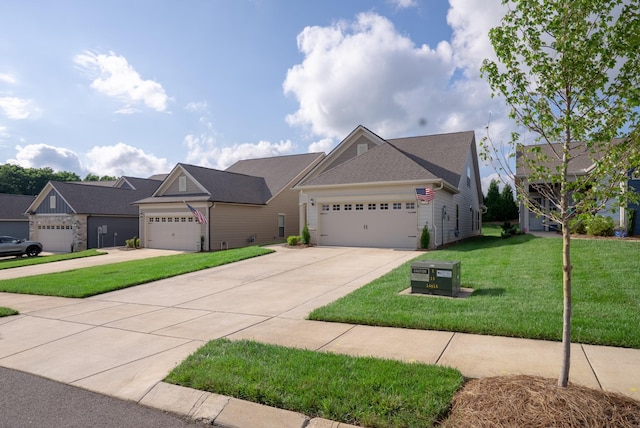 1727 Humphreys Gln, Spring Hill, TN 37174 - view of front of home featuring a front lawn, concrete driveway, and an attached garage