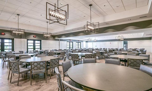 1727 Humphreys Gln, Spring Hill, TN 37174 - dining space with wood finished floors, a chandelier, healthy amount of natural light, and a drop ceiling
