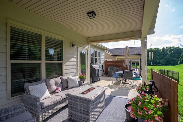 1727 Humphreys Gln, Spring Hill, TN 37174 - view of patio / terrace featuring a grill, an outdoor living space with a fire pit, and outdoor dining area