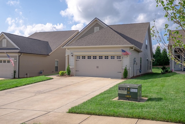 1727 Humphreys Gln, Spring Hill, TN 37174 - view of front of property featuring concrete driveway, a garage, a front lawn, and roof with shingles