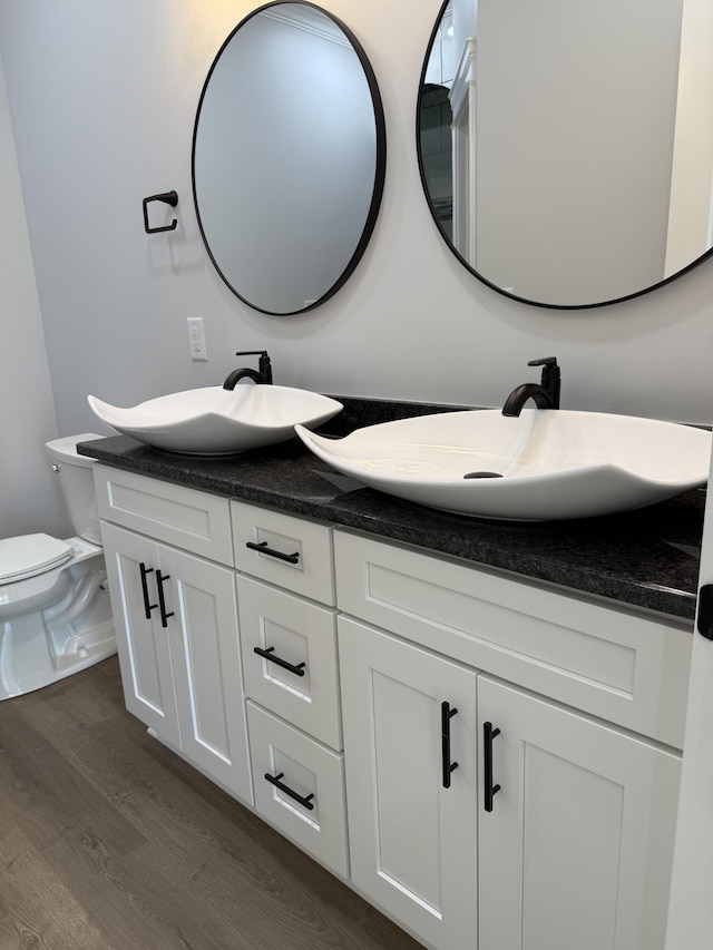 711 Johnson St, Clarksville, TN 37043 - bathroom with wood finished floors and double vanity