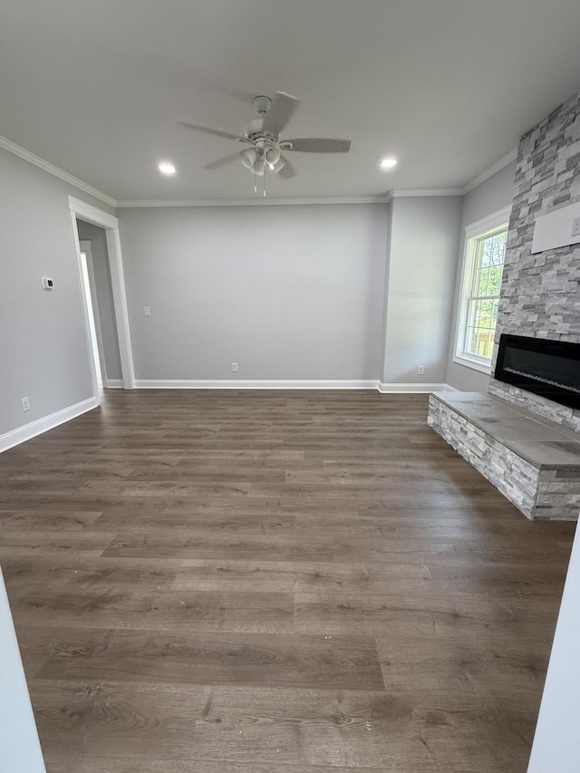 711 Johnson St, Clarksville, TN 37043 - unfurnished living room featuring crown molding, a ceiling fan, a stone fireplace, recessed lighting, and wood finished floors