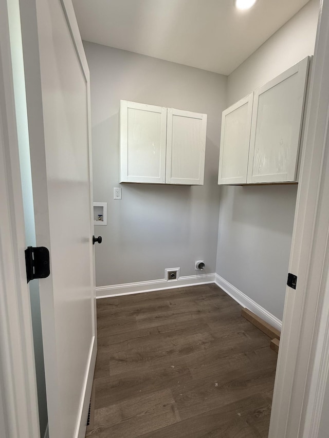 711 Johnson St, Clarksville, TN 37043 - washroom with cabinet space, washer hookup, dark wood-style flooring, and hookup for an electric dryer