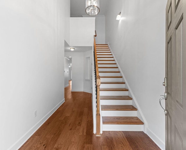 526 Sydenham Dr, Franklin, TN 37064 - staircase with wood finished floors and a chandelier