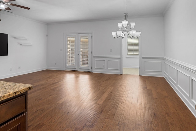 526 Sydenham Dr, Franklin, TN 37064 - unfurnished dining area with plenty of natural light, a chandelier, crown molding, a ceiling fan, and dark wood finished floors