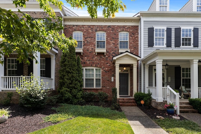 526 Sydenham Dr, Franklin, TN 37064 - view of front facade featuring brick siding and covered porch