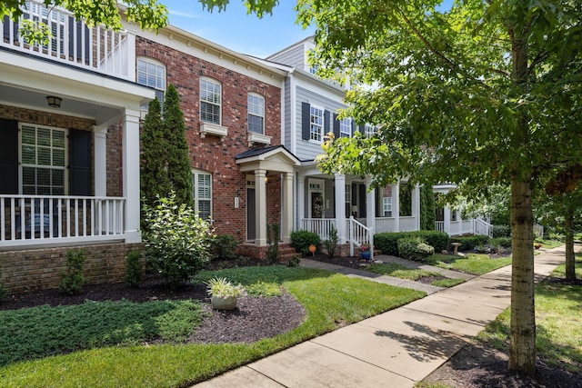 526 Sydenham Dr, Franklin, TN 37064 - view of front of home with a porch and brick siding