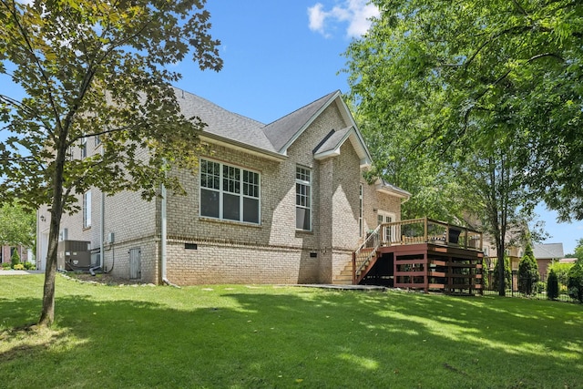 4019 Fremantle Cir, Spring Hill, TN 37174 - view of home's exterior featuring stairs, a deck, a yard, and brick siding