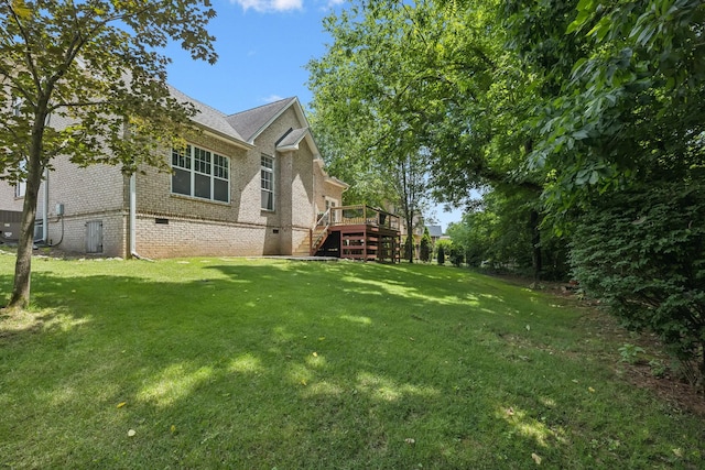 4019 Fremantle Cir, Spring Hill, TN 37174 - view of grassy yard featuring stairway and a wooden deck