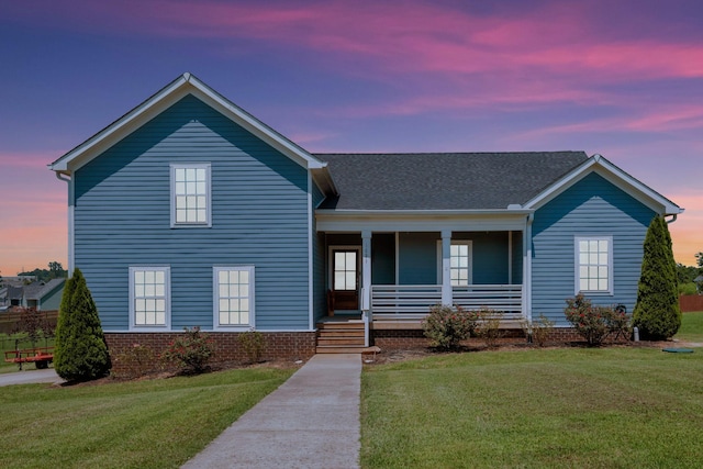 1021 Tulip Dr, Ashland City, TN 37015 - view of front of house with covered porch and a yard