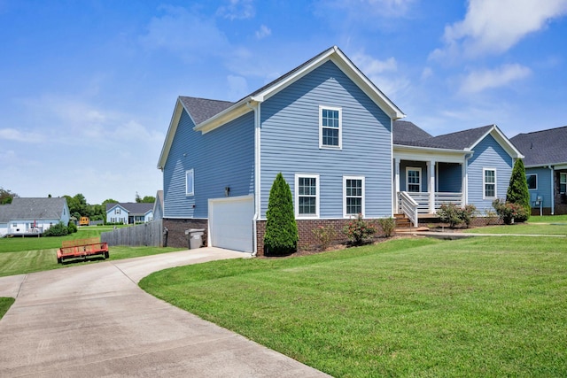 1021 Tulip Dr, Ashland City, TN 37015 - view of front of property with concrete driveway, a porch, and an attached garage