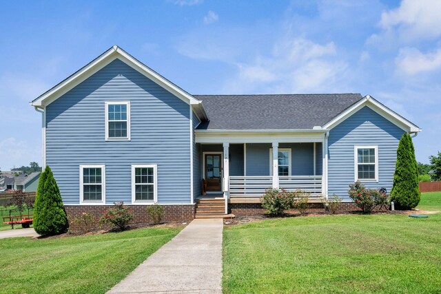 1021 Tulip Dr, Ashland City, TN 37015 - view of front of home with a porch and a front yard