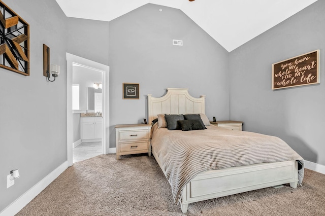 1021 Tulip Dr, Ashland City, TN 37015 - bedroom featuring light colored carpet, ensuite bath, and high vaulted ceiling