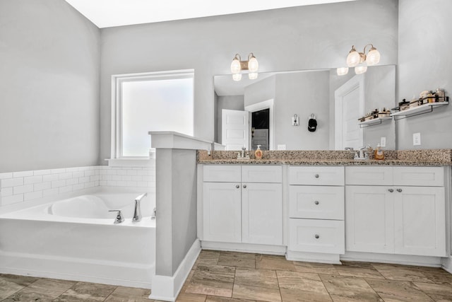 1021 Tulip Dr, Ashland City, TN 37015 - bathroom featuring double vanity and a bath