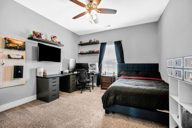 1021 Tulip Dr, Ashland City, TN 37015 - bedroom with light carpet, a desk, and a ceiling fan