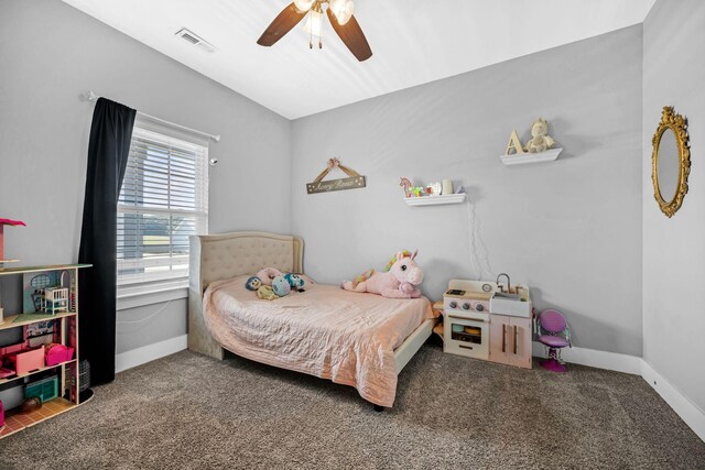 1021 Tulip Dr, Ashland City, TN 37015 - carpeted bedroom featuring a ceiling fan and baseboards