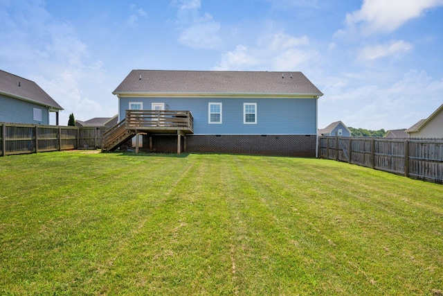 1021 Tulip Dr, Ashland City, TN 37015 - rear view of property with stairway, a fenced backyard, a deck, and crawl space