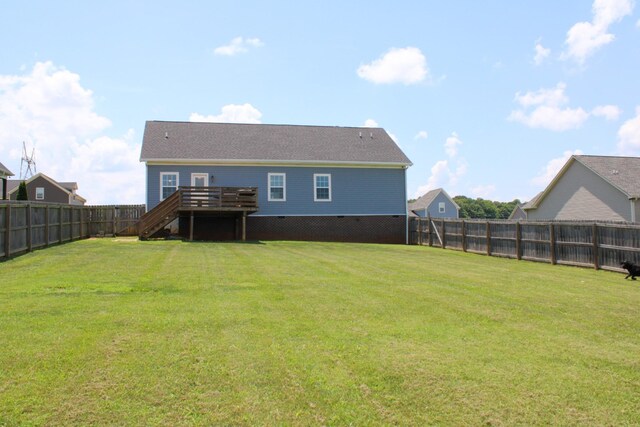 1021 Tulip Dr, Ashland City, TN 37015 - rear view of property featuring a fenced backyard, stairs, and a deck