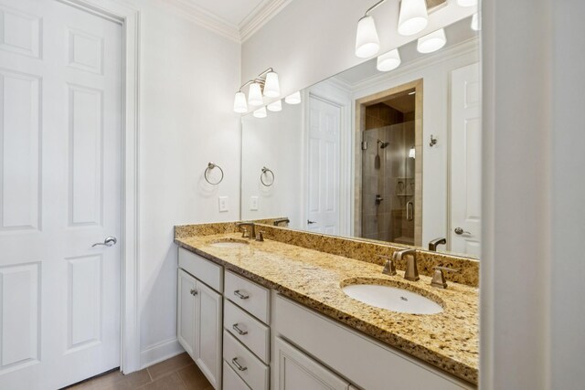 9020 Wenlock Ln, Franklin, TN 37064 - full bath with a shower stall, double vanity, ornamental molding, and tile patterned floors