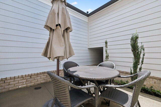 9020 Wenlock Ln, Franklin, TN 37064 - wooden terrace with outdoor dining area