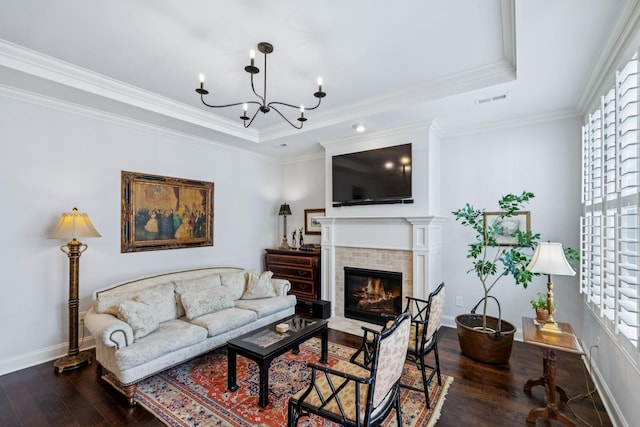 9020 Wenlock Ln, Franklin, TN 37064 - living room with wood-type flooring, plenty of natural light, a tray ceiling, and ornamental molding