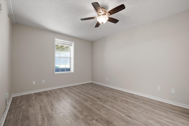4328 Monticello Trce, Adams, TN 37010 - spare room featuring light wood finished floors, a textured ceiling, and a ceiling fan