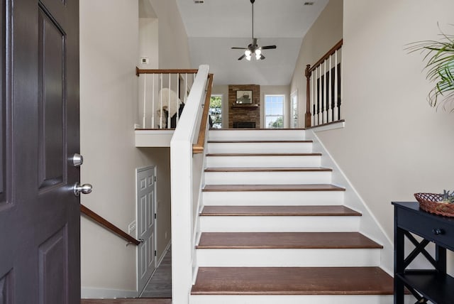 4328 Monticello Trce, Adams, TN 37010 - stairs with ceiling fan, lofted ceiling, and wood finished floors