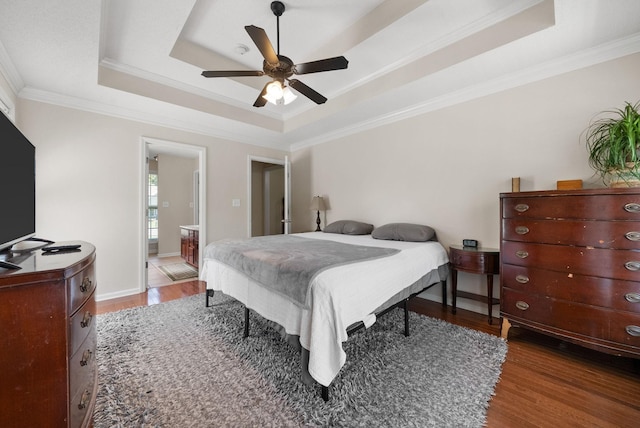4328 Monticello Trce, Adams, TN 37010 - bedroom with a raised ceiling, wood finished floors, crown molding, and a ceiling fan