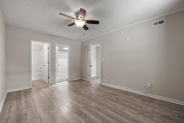 4328 Monticello Trce, Adams, TN 37010 - unfurnished room with a ceiling fan, a textured ceiling, wood finished floors, and crown molding