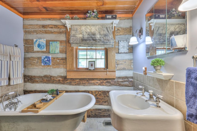 569 Hogans Branch Rd, Hendersonville, TN 37075 - full bathroom with a bathtub, wooden ceiling, and tile walls