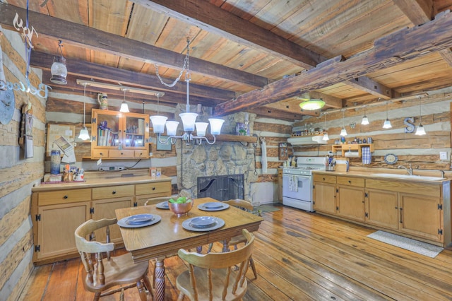 569 Hogans Branch Rd, Hendersonville, TN 37075 - dining space with a wooden ceiling with exposed beams, light wood-style flooring, and a chandelier
